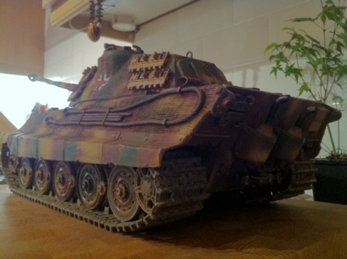 Heres my Tamiya King Tiger i got off Fleabay - its got the latest gear boxes fitted and someone has put Zimmerit on it. This tank is from the 80's and is the old clutch gear box model and all i can say is i left it outside for a whole day as it smelt of smoke!!!! It is going to be a good project.
