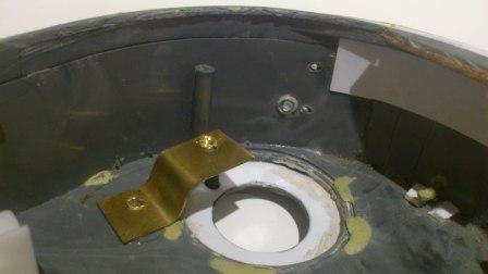 Inside turret showing brass strip bent to replace the missing mount for the recoil unit.JPG