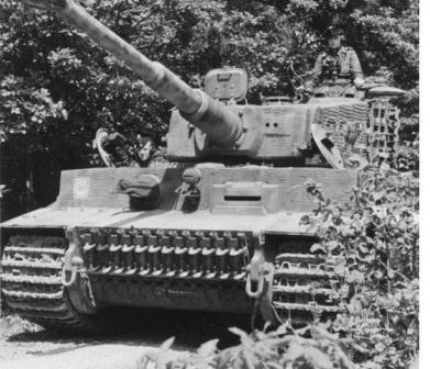 Actually Tiger 232 of s.SS-Pz.Abt.101 - so a late production model - but showing classic combination or lower cupola, central headlight and zimmerit - note differences between pattern on hull and turret.jpg
