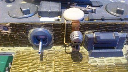 On the glacis plate the Taigen zimmerit also needs quite  a lot of work to fill in gaps around the MG and driver's visor - the remaining work was the result of my decision to move it forward to overlap the front of the hull.jpg