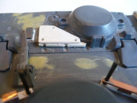 Close-up showing triangular engine access plate.jpg