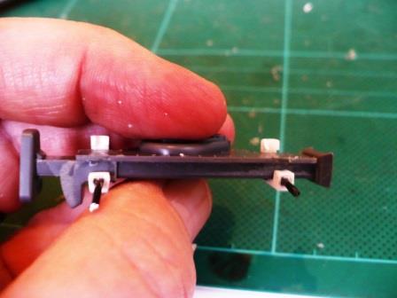 Two lengths of metal rod were inserted into the rear of the new clamps to fit into corresponding holes drilled in the rear plate.jpg