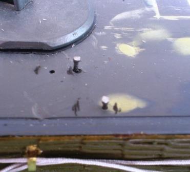 Small tacks were inserted into holes drilled in the hull roof to provide an achor for the plastic brackets.jpg