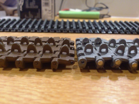 Comparison of Kenny Kong (on left) and Impact (on right) - the better detail on the end of the track pins can be clearly seen on the Impact tracks.jpg