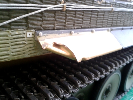 The inevitable outcome of careless driving in a 60 tonne tank....jpg