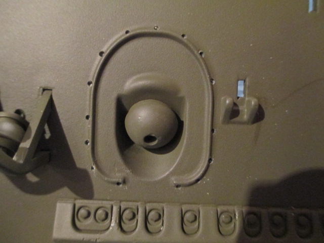 Holes drilled in the MG ring using a #61 drill bit and yankee drill
