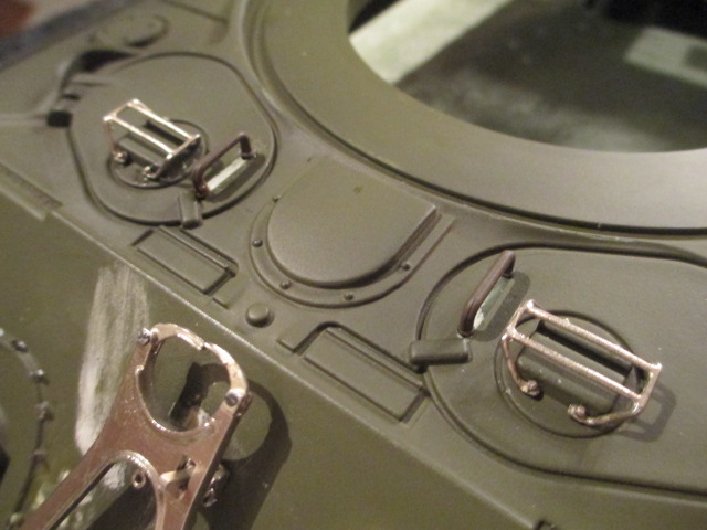Hatches drilled and handles mounted along with nice periscope guards