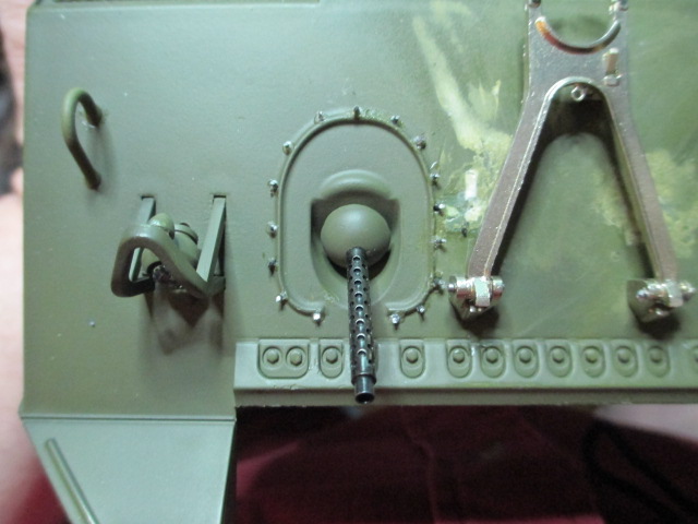 First thing was to clip and file all those spikes down to a scale length for the MG ring cover