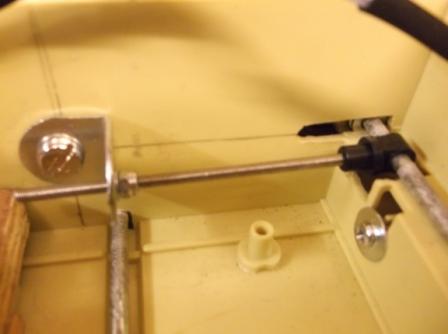 Track tensioning system using 3mm threaded rod and suspension parts from an RC car.