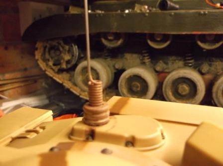 RC boat aerial fitted into a hole drilled into the top of the turret. There is a screw terminal on the inside to connect the aerial wire from the RX18 via a single connector.