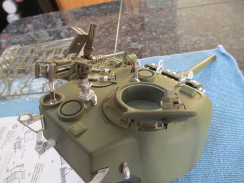 Articulation of loading hatch and ammo can mount