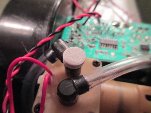 Smoker cap opened up and made into a refill point then capped off by a removable adhesive rubber fitting