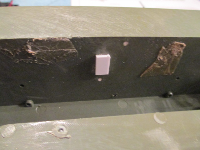 Old and empty selection switch slot on the lower hull sidewall sealed off
