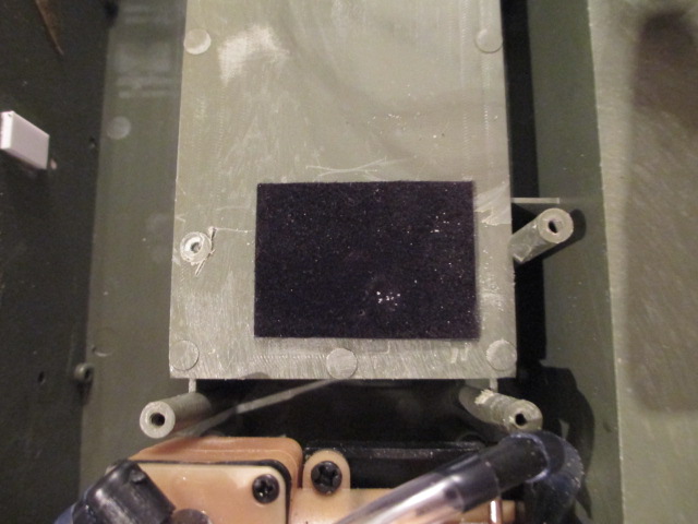 Crystal slot cut down and filed smooth and sealed with a plastic card with velour on one side for cushioning