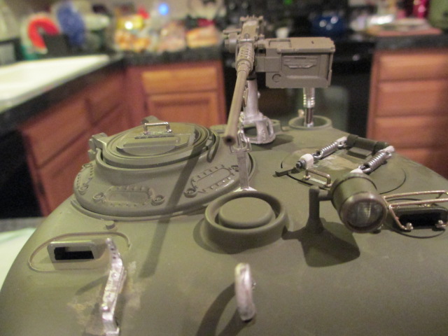 Closeup view from the other side showing the muzzle drilled out.