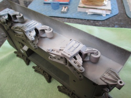 One pass of the primer spray filled the puttied in Switch on the lower hull.