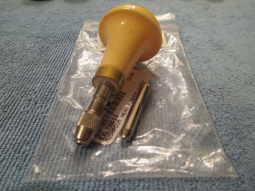 A cool tool with 2 double sided collets giving me the option of several sizes of bits for careful drilling when needed