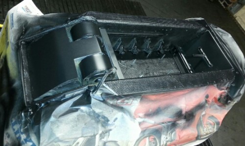 Used 2 coats of primer then three coats of automotive satin black