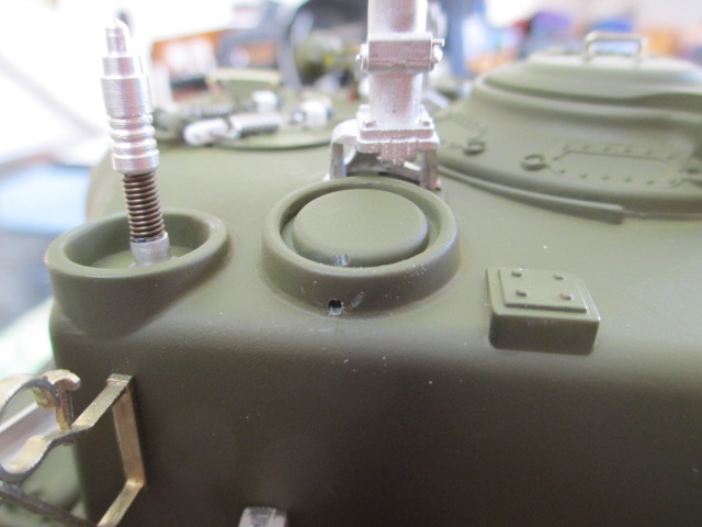 Rear ventilator fan housing weep hole
