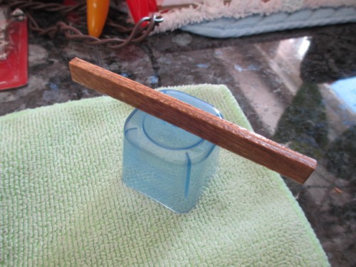 Fresh cherry stain on the bow stowage plank