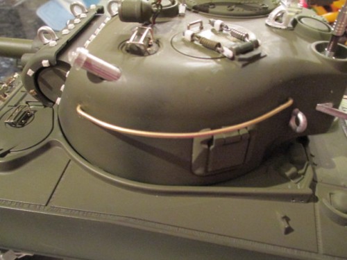 Rail mounted per the illustration in Steve Zaloga's 'Shermans at War'