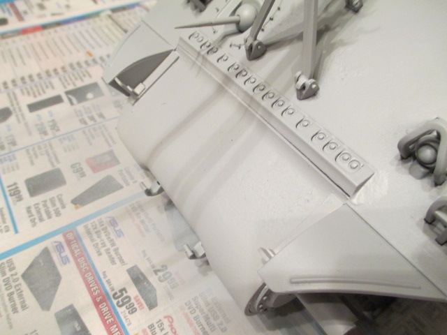 Transmission cover in primer