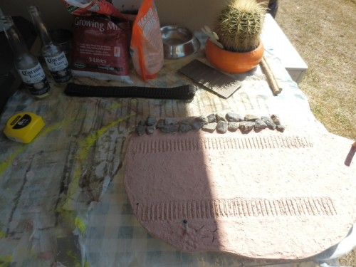 display base track imprints & stone wall base.JPG