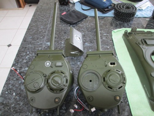 Original turret and newer one with the replacement gun.  Paint is slightly better on the newer turret