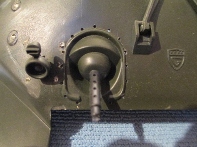 Holes drilled with a number 61 for the studs for the bow mg canvas cover.