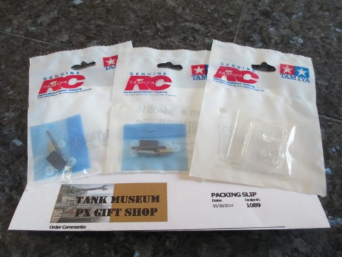 Two Tamiya KV-2 MG kits and a set of the lenses for the same tank.