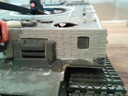 Note the gap in the zimmerit above the driver's visor for the sliding shutter - and the chipped out square for the divisional badge.jpg