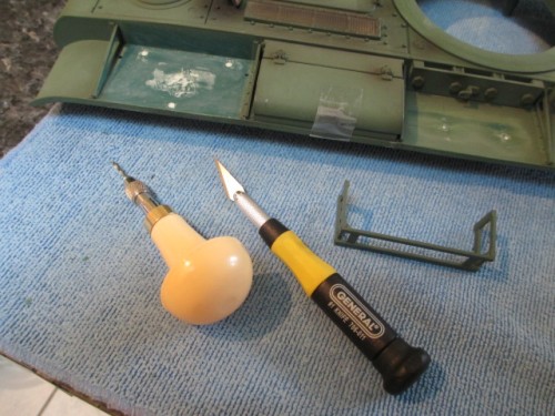 Placement of the spare 'Jerry'can rack.  Holes drilled and rack permanently mounted