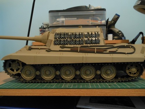The space between the last road wheel and the idler is the extended hull. It is about 26cm or about 12 inches in real life