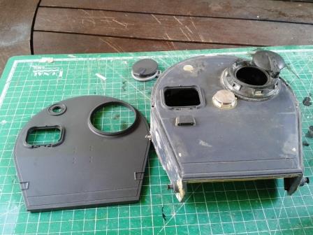 So now all I have to do is remove the HL hatch surround on the right and transplant the Tamiya one from the left....jpg