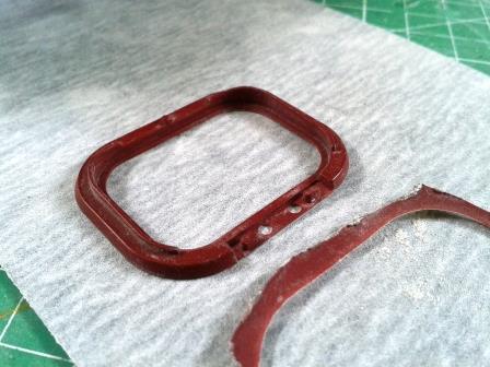 With patient use of fine sandpaper it should be possible for the excess plastic just to fall away.jpg