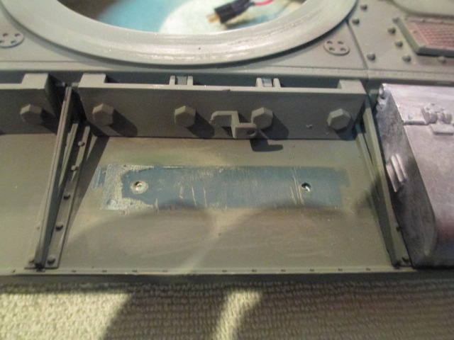 Saw drilled out and removed for paint and reinstall later