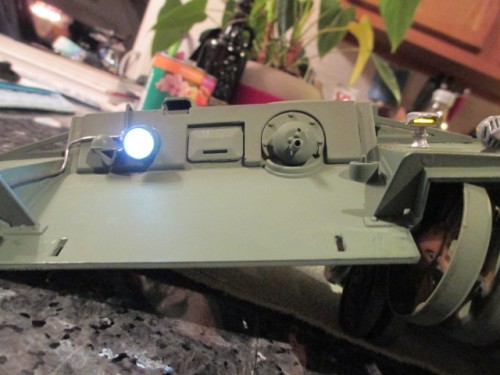 Success. Both the headlight and NOTEK light are illuminated off the same wiring circuit.