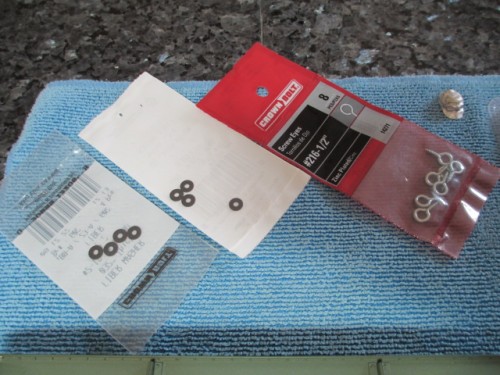 Eight .38 eye hooks and .25 fiber washers to make up the beefy lifting eyes on the KV-2's rear deck