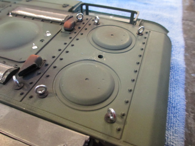 Rear lifting eyes added by drilling pilot hole with #63 and then screwing the eyes and washers into place.