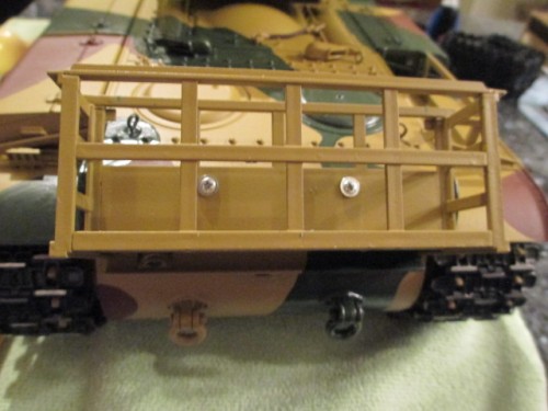 I held the spare ammunition rack in place, marked the screw location with a small drill bit and then drilled to fit.