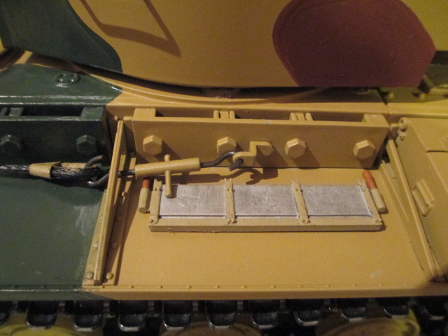 Saw remounted next to the excellent Taigen metal tow cable hooks
