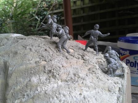 The Americans storming up the slope towards the German positions.jpg