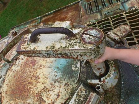 Here you can see the hatch handle, rain (or sun) cover support and the armoured sleeve around the hatch pivot (plus Arthur's hand for scale).jpg