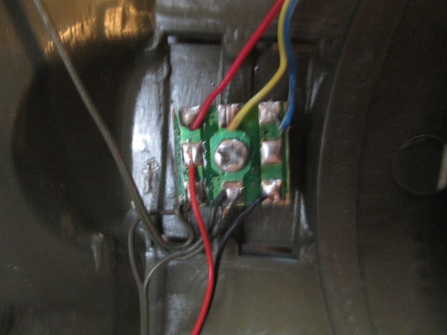 Small board which powers the headlights and bow mg.  The replacement wiring scheme will be much easier.