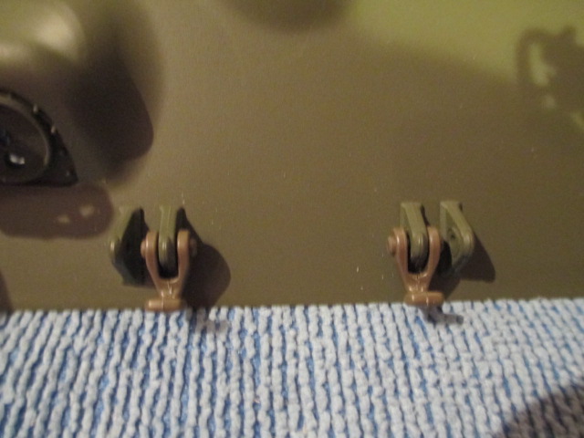Simple two piece Tamiya tow hooks  attach directly to the HL mounts with no modding needed.