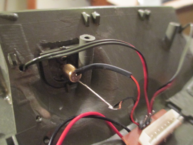 I took a tip from HL and used rubber cement  to keep the led in place.