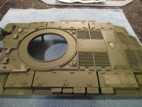 Last job for the evening was drilling for and gluing into place all of the stowage bin handles from Tamiya.