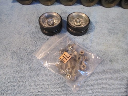 Metal idlers and suspension arms