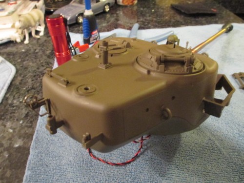 Drilled out the Commander's vane sight, added detail to the rear of the turret and on it goes.