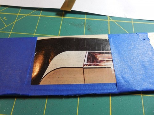 Magazine paper taped over the brass